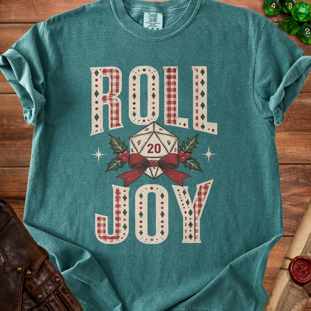 T-shirt with "Roll Joy" text, a twenty-sided die, and festive accents.