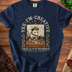 Opossum wearing Viking helmet with map and text "YES. I'M CREATIVE" and "I CREATE ALL OF MY OWN PROBLEMS".