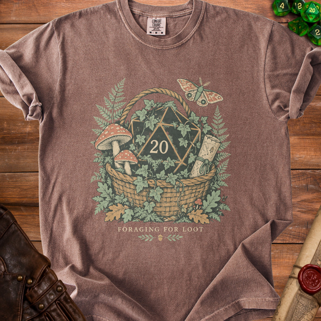 Brown t-shirt with "Foraging for Loot" text and a D20 dice in a basket.