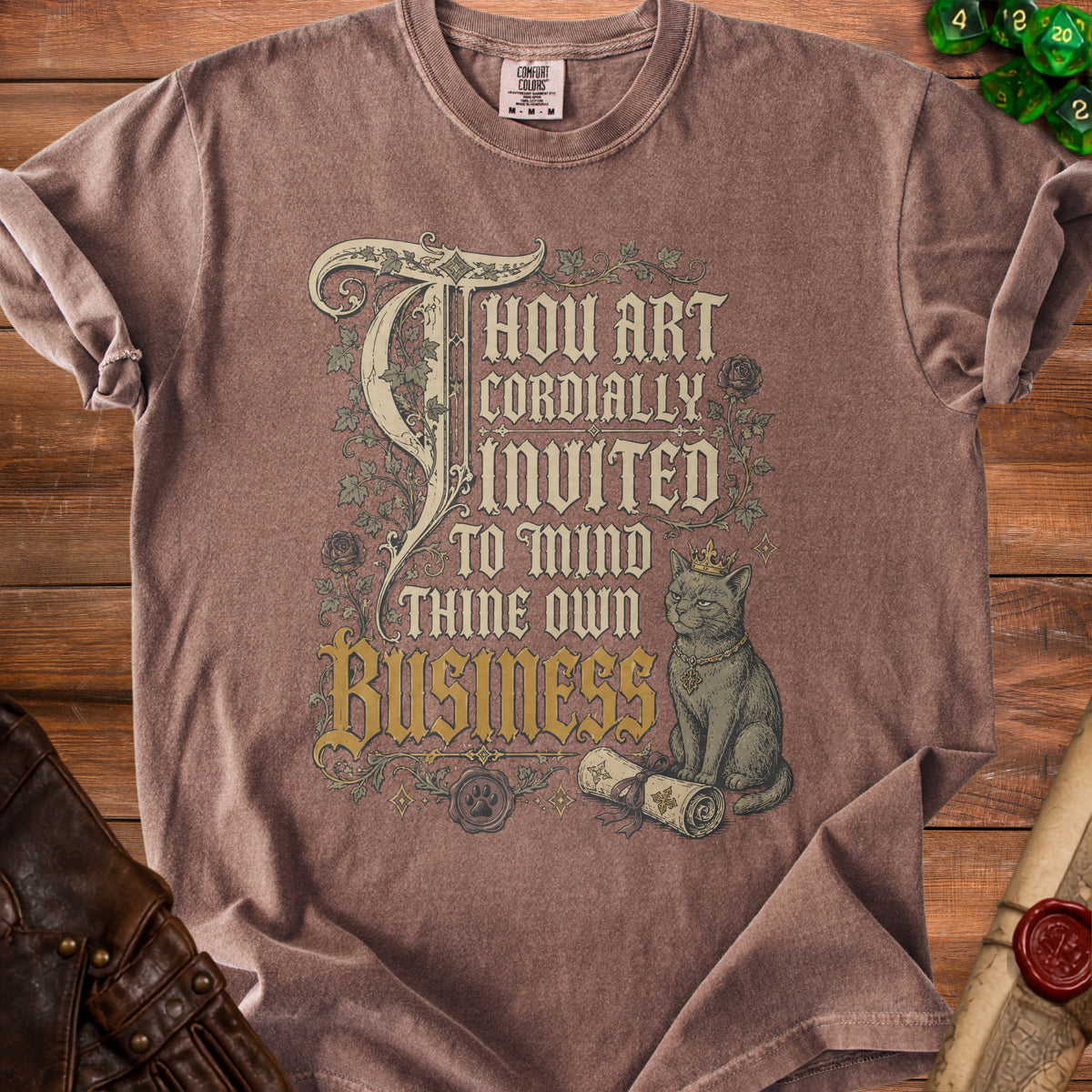 Brown t-shirt with "Thou Art Cordially Invited to Mind Thine Own Business" text and a cat.