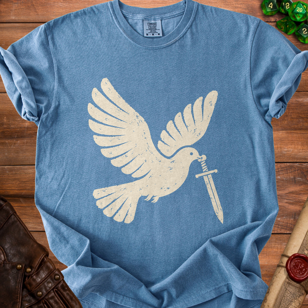 Blue t-shirt with a cream dove holding a sword graphic and a Comfort Colors tag.