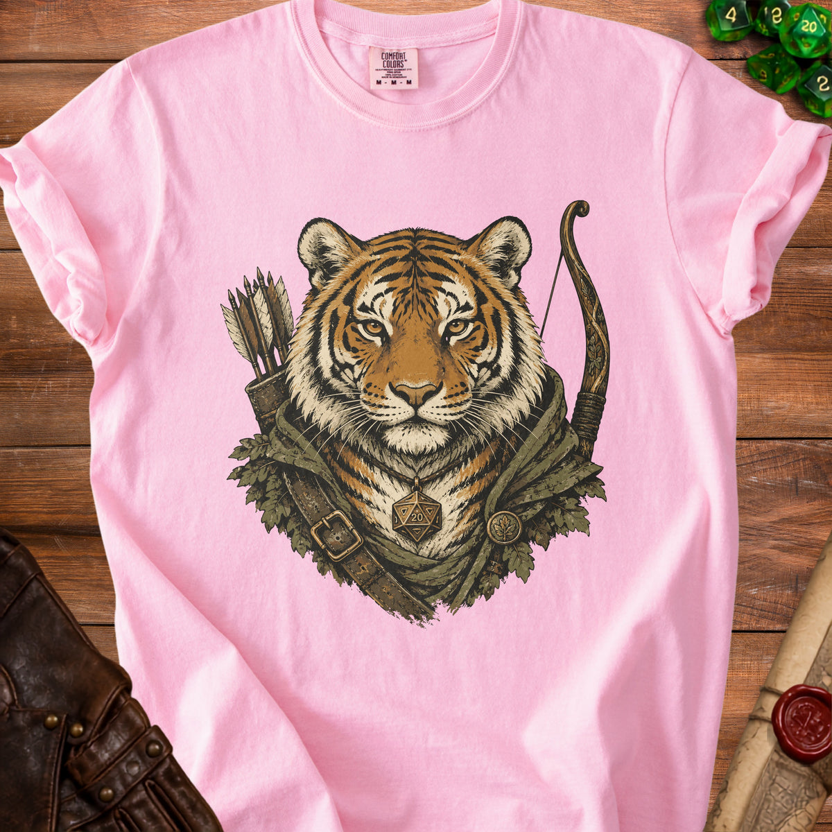 Pink t-shirt with a tiger in adventurer gear, bow, arrows, and D20 necklace.