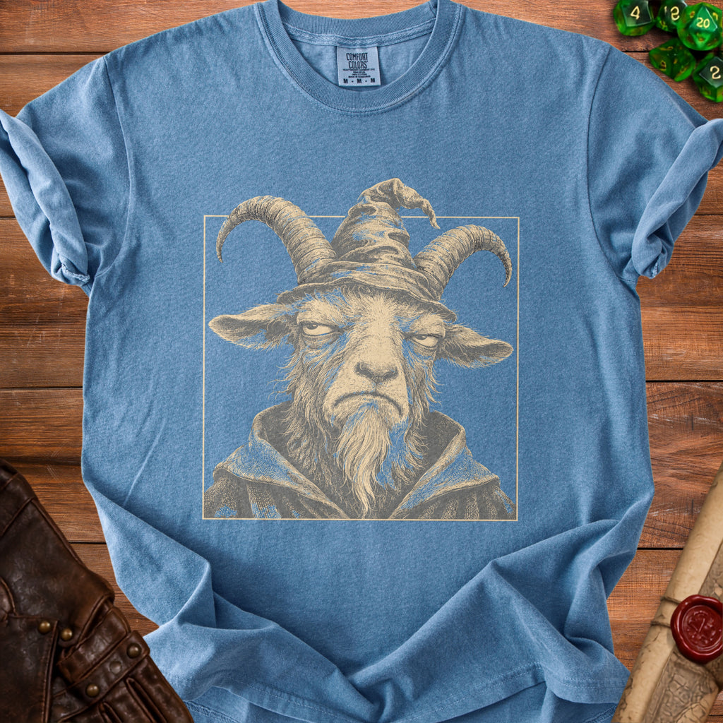 Blue t-shirt with a graphic of a goat wearing a wizard hat and robes.