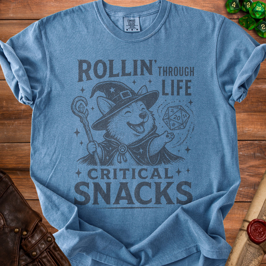 Blue t-shirt with a corgi wearing a wizard hat and holding a D20 dice.