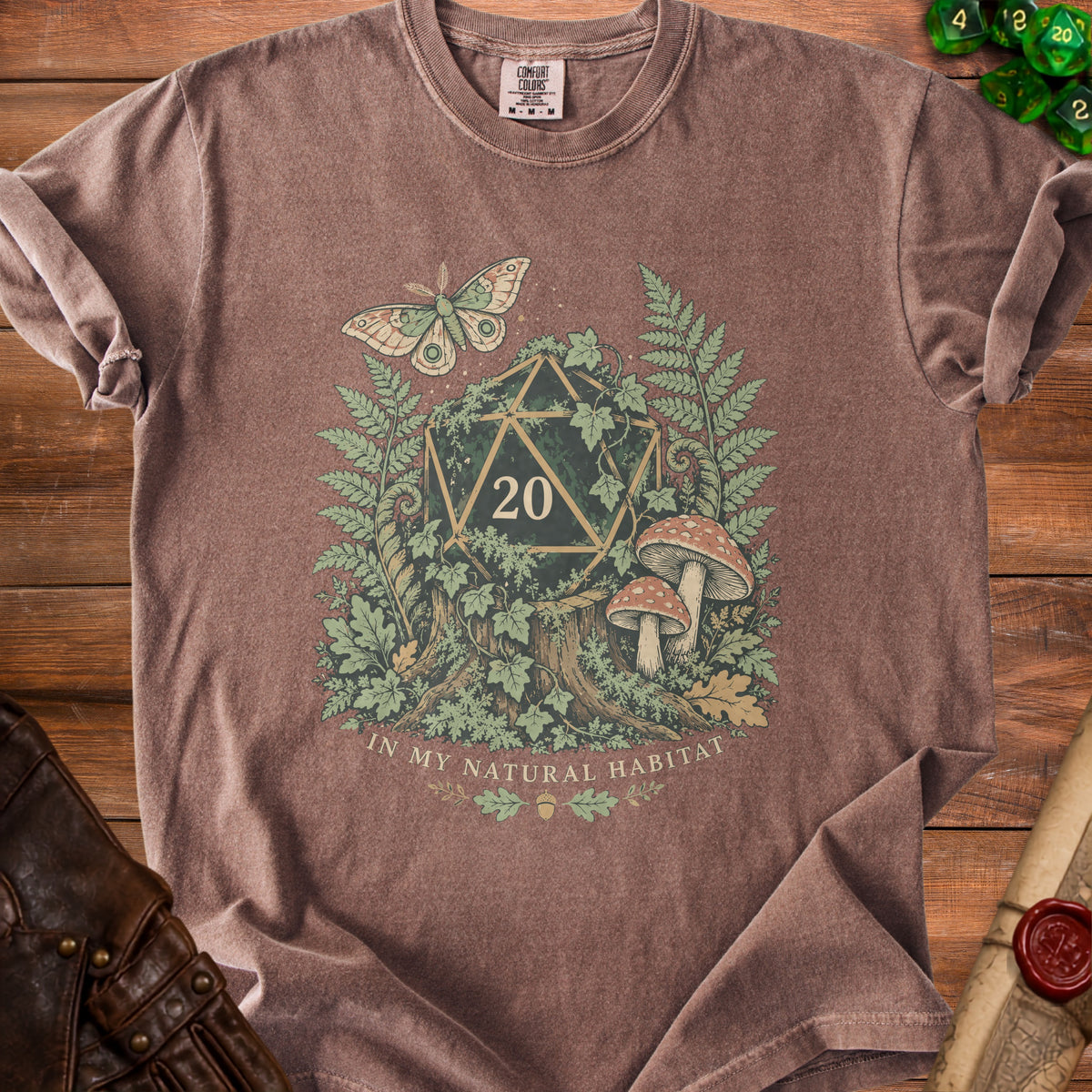T-shirt with a D20 die, moth, mushrooms, ferns, and text "IN MY NATURAL HABITAT".