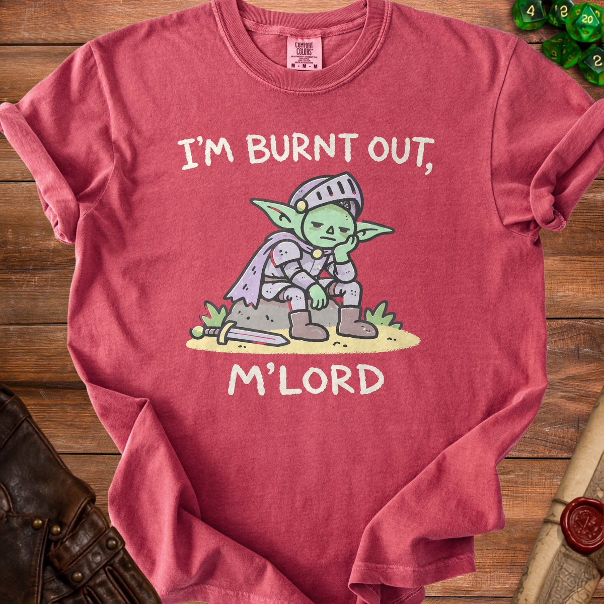 Red t-shirt with cartoon goblin knight and text "I'M BURNT OUT, M'LORD".