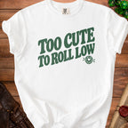 White t-shirt with green text that reads "TOO CUTE TO ROLL LOW".