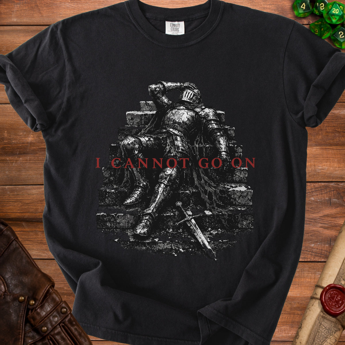 Black t-shirt with a distressed knight artwork and text "I CANNOT GO ON".