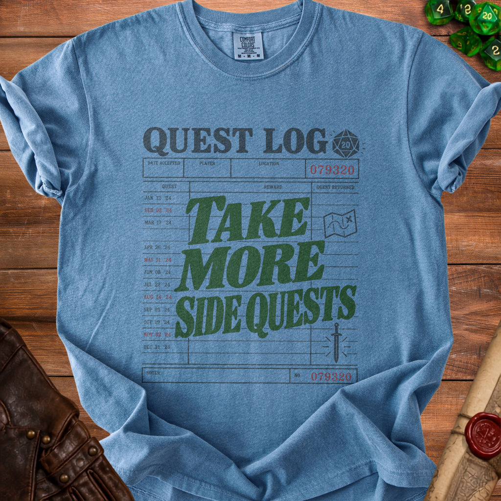 Blue t-shirt with "Quest Log: Take More Side Quests" graphic.