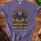 Purple t-shirt with Mothman graphic and text "Wish my parents would've added some nepo to the tism they gave me."