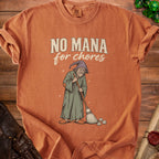 Orange t-shirt with "NO MANA for chores" text and wizard sweeping.