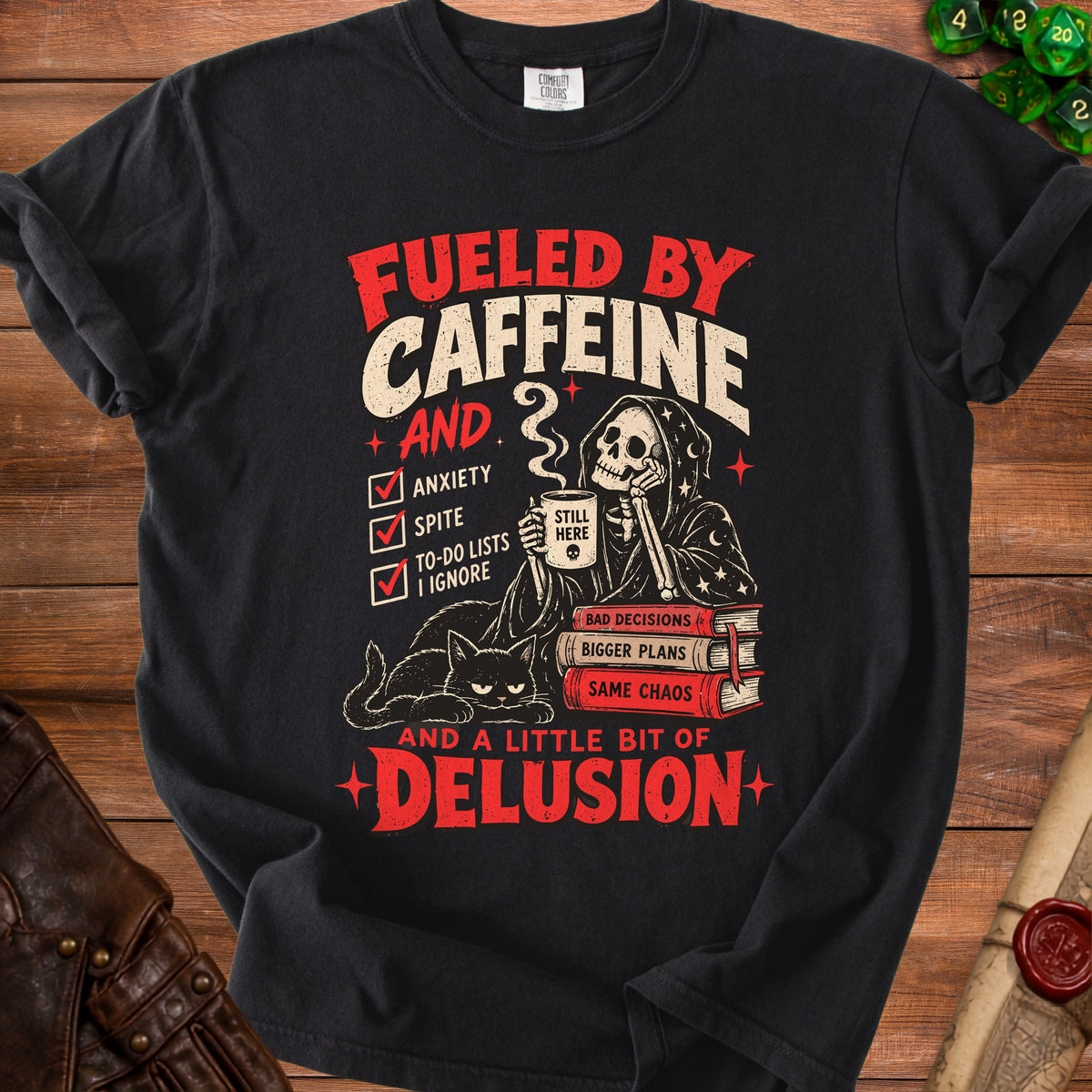 Black t-shirt with "Fueled by Caffeine and a little bit of Delusion" text.