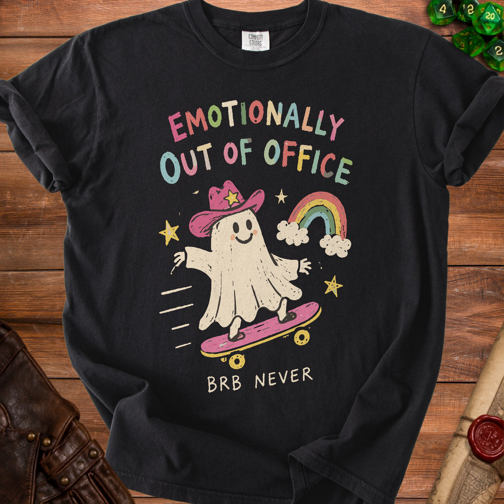 Black t-shirt with a ghost wearing a cowboy hat on a skateboard, text "EMOTIONALLY OUT OF OFFICE BRB NEVER".