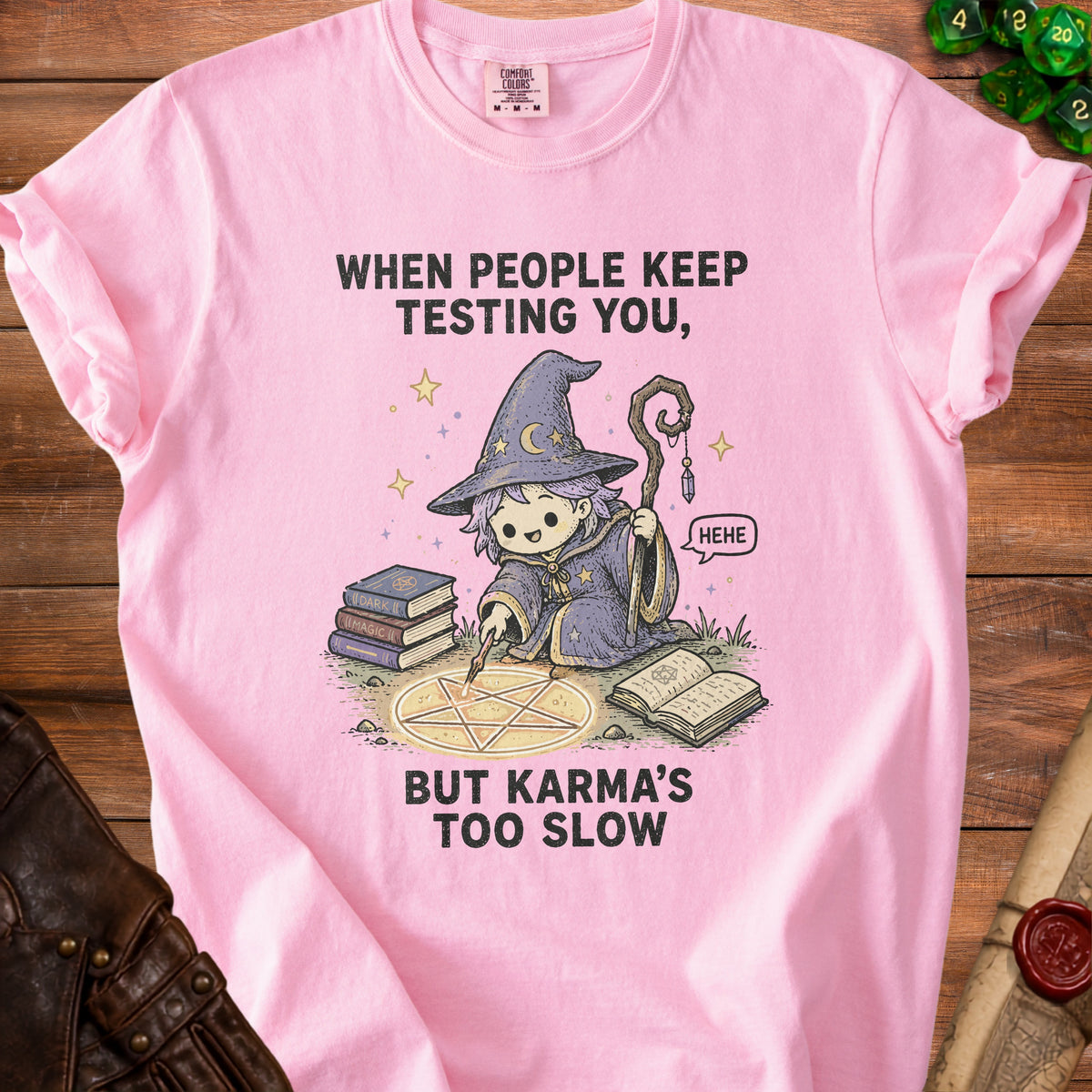 Pink t-shirt with a witch drawing and text "When people keep testing you, but karma's too slow."