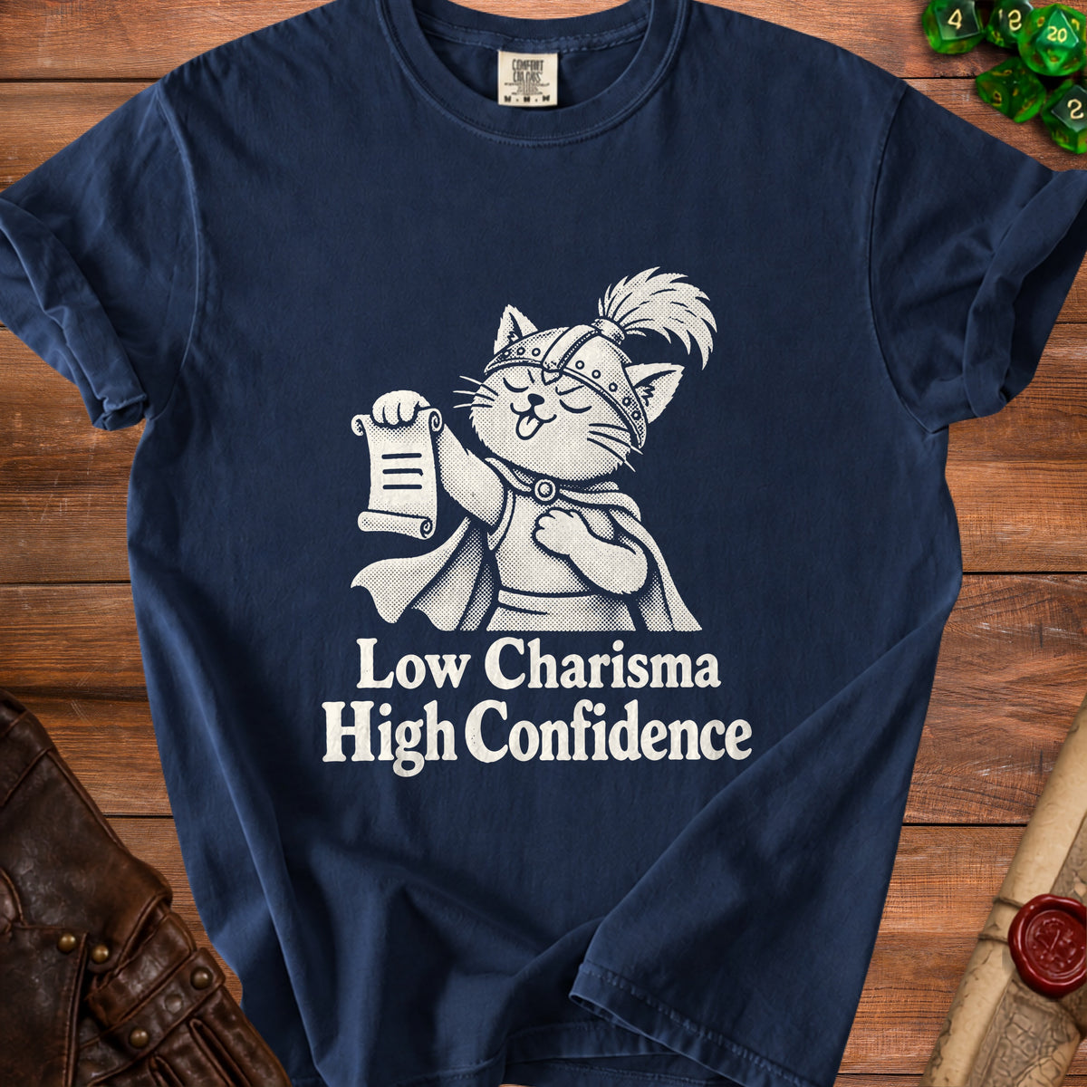 Navy t-shirt with a cartoon cat in a helmet holding a scroll, text reads "Low Charisma High Confidence".