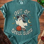 Ghost with wizard hat holding wand, text "OUT OF SPELL SLOTS," dice, mushrooms.