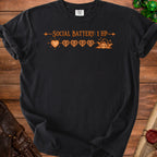 Black t-shirt with "SOCIAL BATTERY: 1 HP" and heart icons.