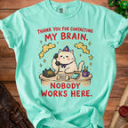 Aqua t-shirt with a cat at a desk saying "Thank you for contacting my brain. Nobody works here."