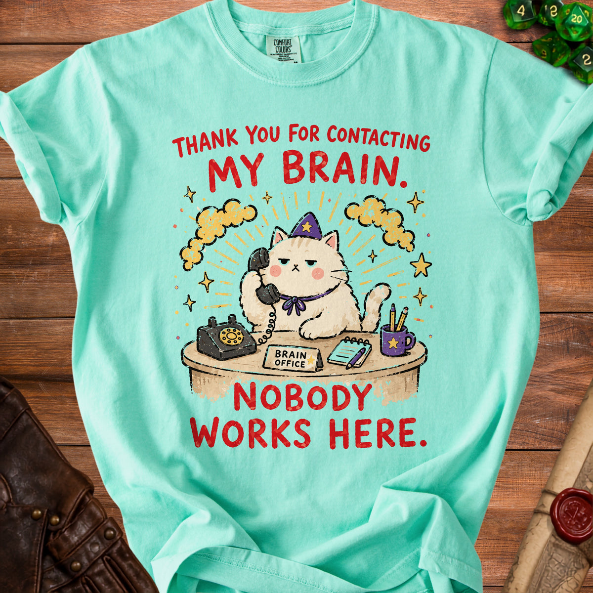 Aqua t-shirt with a cat at a desk saying "Thank you for contacting my brain. Nobody works here."