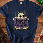 Navy t-shirt with skull in pot graphic that reads "Soup of the Day: Existence."