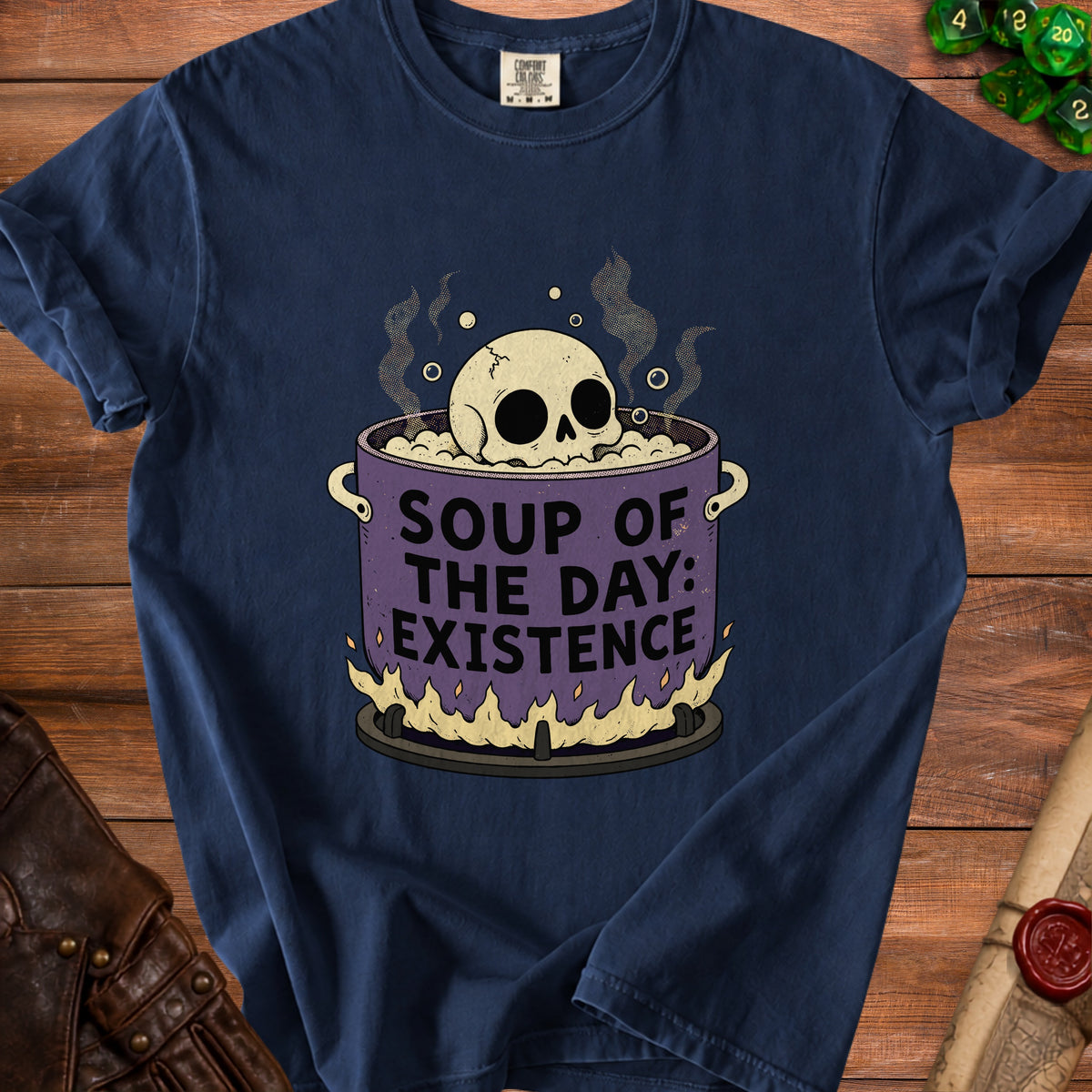 Navy t-shirt with skull in pot graphic that reads "Soup of the Day: Existence."
