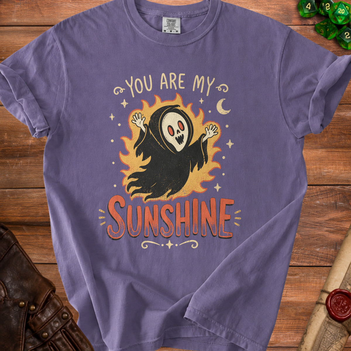 Purple t-shirt with Grim Reaper character and text "YOU ARE MY SUNSHINE".