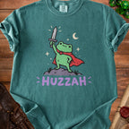 Frog wearing a cape and holding a sword with "HUZZAH" text below.