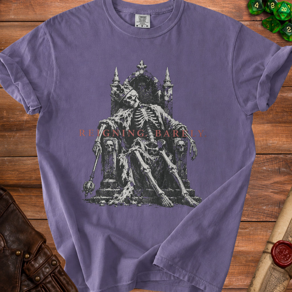 Skeleton on a throne wearing a crown and holding a scepter with text "Reigning Barely."