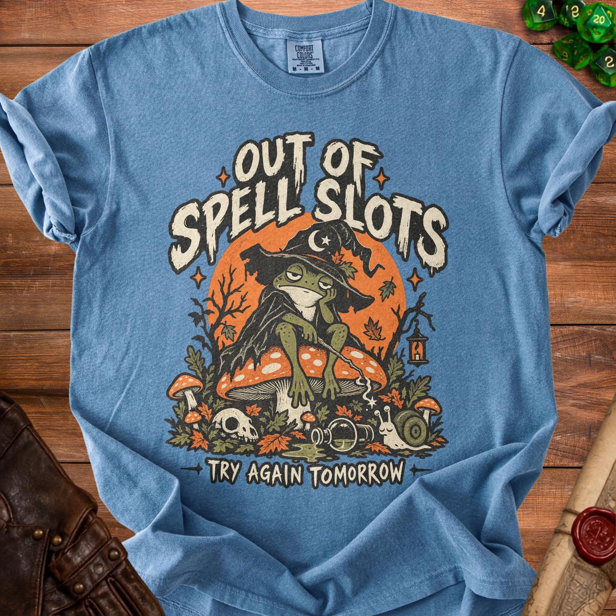 Blue t-shirt with a frog wearing a wizard hat and text "Out of Spell Slots Try Again Tomorrow".