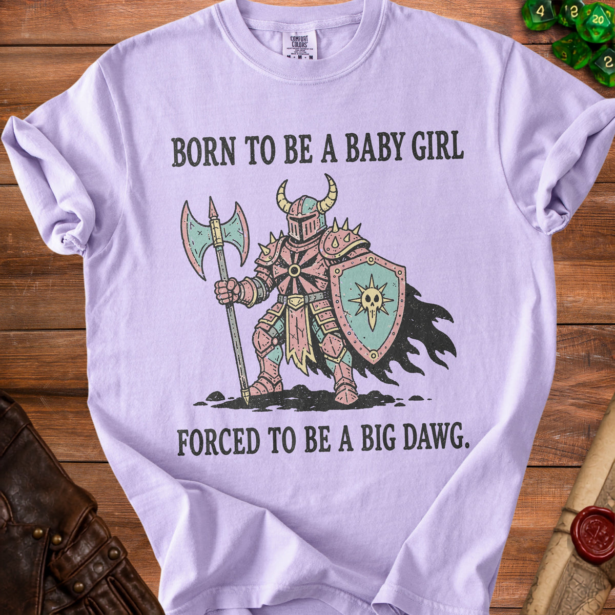Light purple t-shirt with text "BORN TO BE A BABY GIRL FORCED TO BE A BIG DAWG."
