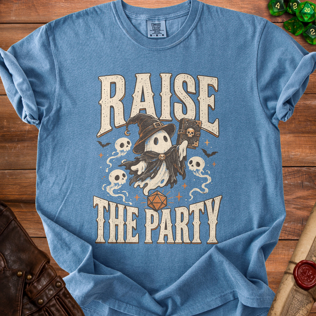 Blue t-shirt with ghost holding book and text "RAISE THE PARTY".