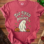 T-shirt with "Too Tired to Haunt" text and a sad ghost with pumpkins.