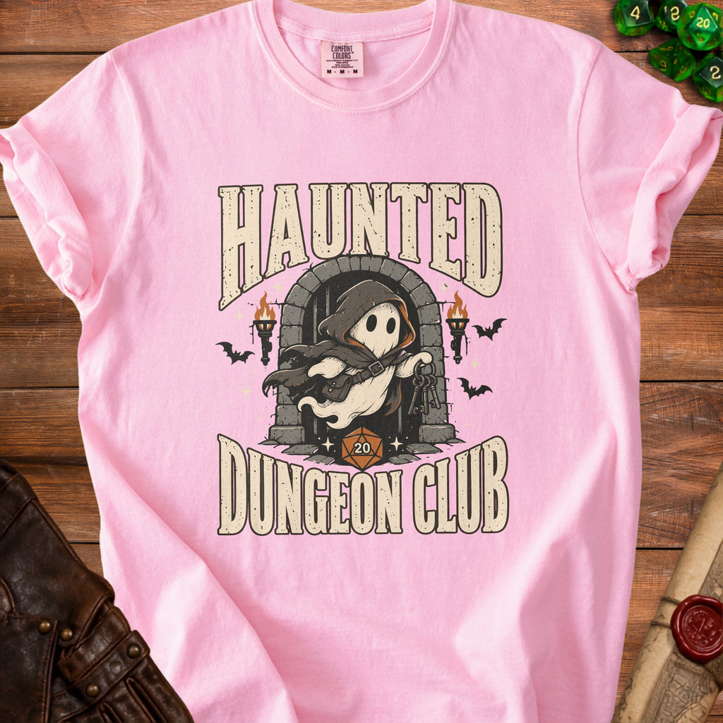 Pink t-shirt with "Haunted Dungeon Club" text and a ghost character design.