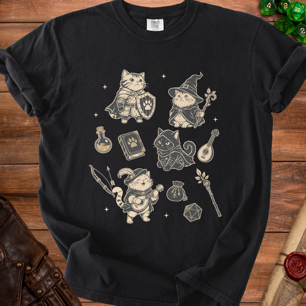 Black t-shirt with a fantasy cat adventure graphic featuring a knight, wizard, rogue, and bard.