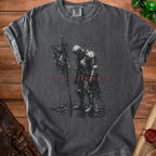 Dark grey t-shirt with a graphic of a knight in armor holding a tattered banner in the rain.