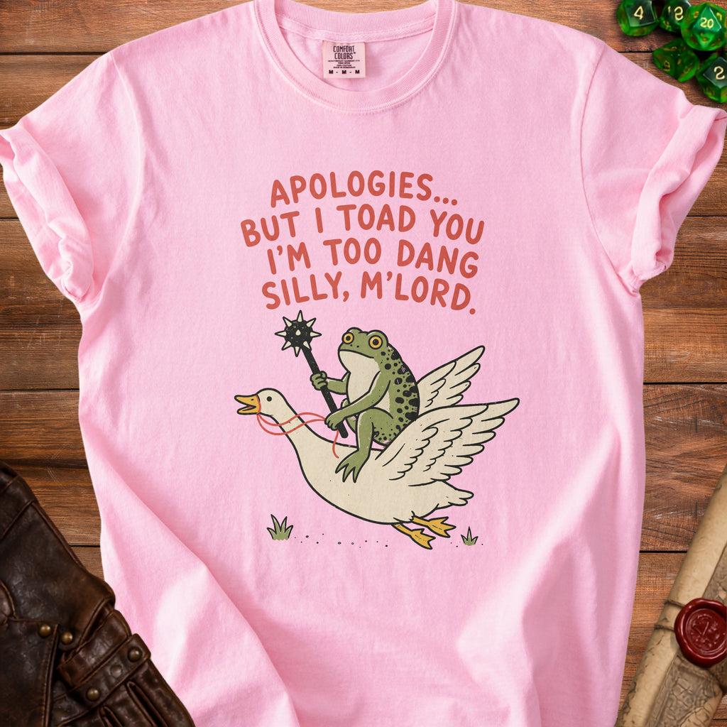 Pink t-shirt with text and cartoon of frog riding a duck.