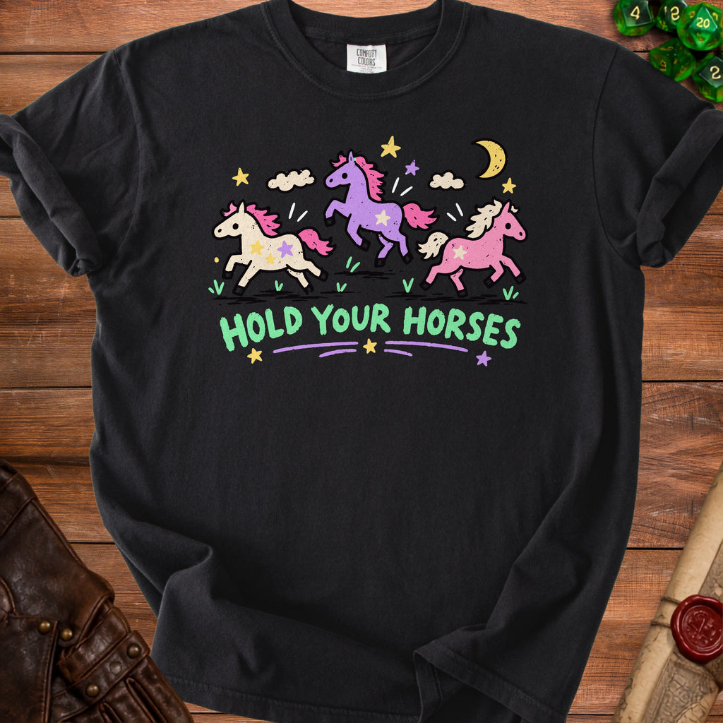 Black t-shirt with three cartoon horses, stars, moon, and text "HOLD YOUR HORSES".