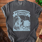 Gray t-shirt with a light blue graphic of a wizard and "Spreadsheet Sorcery" text.