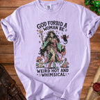Light purple t-shirt with "God forbid a woman be weird hot and whimsical" graphic.