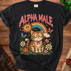 Black t-shirt with "ALPHA MALE" text above a cartoon cat with a rainbow and smiley sun.
