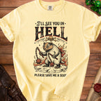 Yellow t-shirt with badger graphic and text "I'll See You In Hell Please Save Me A Seat".
