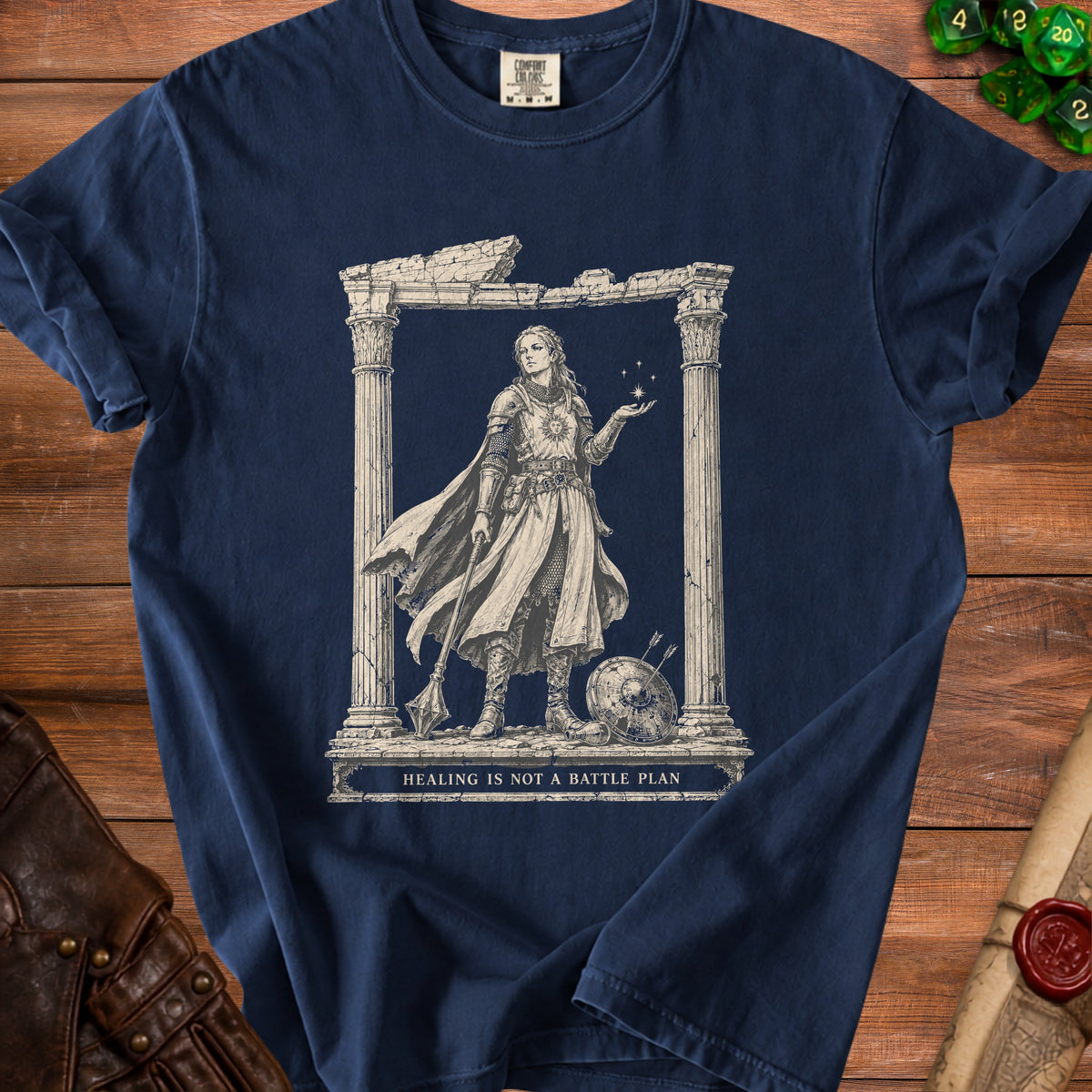 Navy t-shirt with a fantasy warrior print and the text "HEALING IS NOT A BATTLE PLAN".