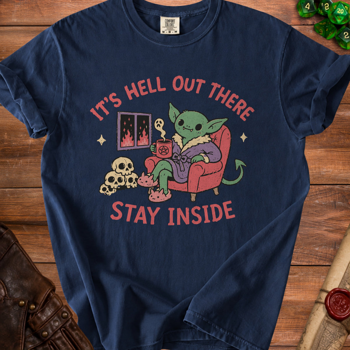 Navy t-shirt graphic with text "It's Hell Out There Stay Inside".