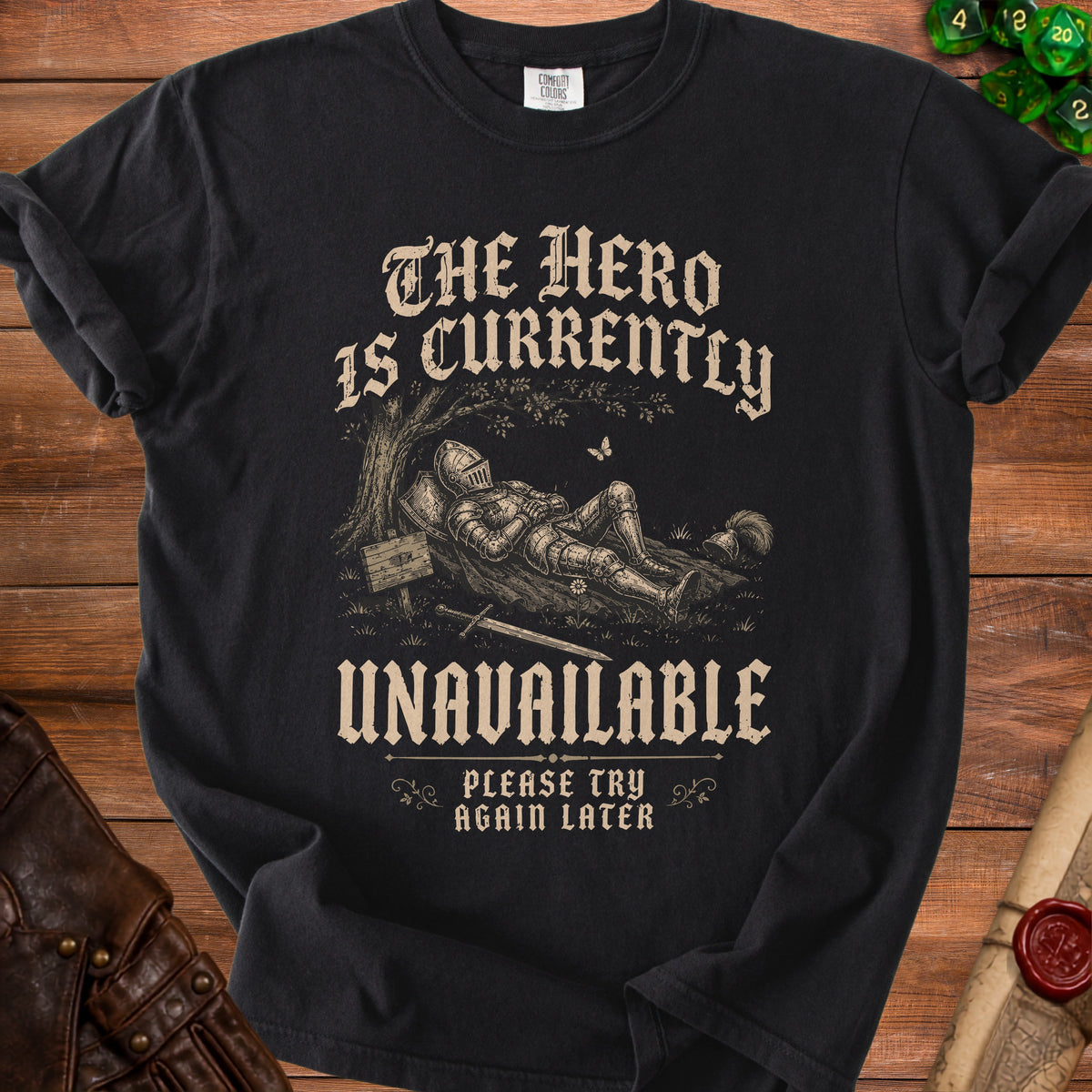 Black t-shirt with knight graphic and text "The Hero Is Currently Unavailable".