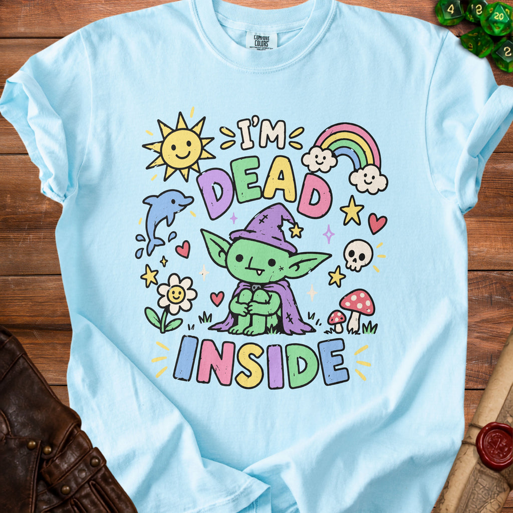 Light blue t-shirt with cartoon goblin saying "I'm Dead Inside" and cute illustrations.