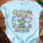 Light blue t-shirt with cartoon goblin saying "I'm Dead Inside" and cute illustrations.