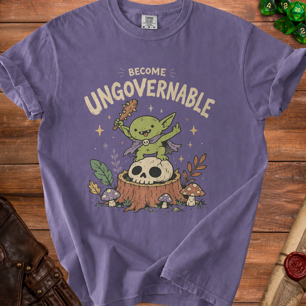 Purple t-shirt with a goblin on a skull and stump saying "BECOME UNGOVERNABLE".