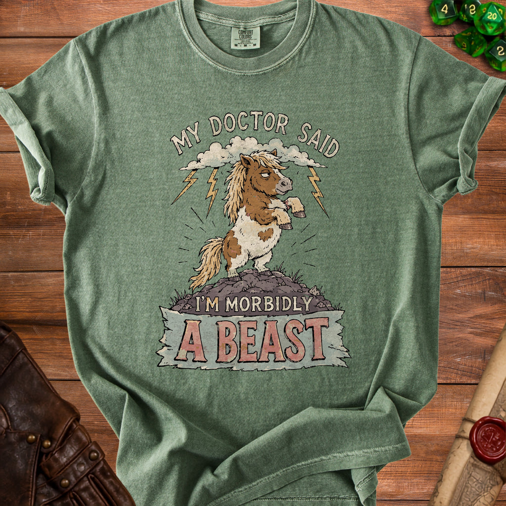 Green t-shirt with cartoon pony and text "MY DOCTOR SAID I'M MORBIDLY A BEAST".