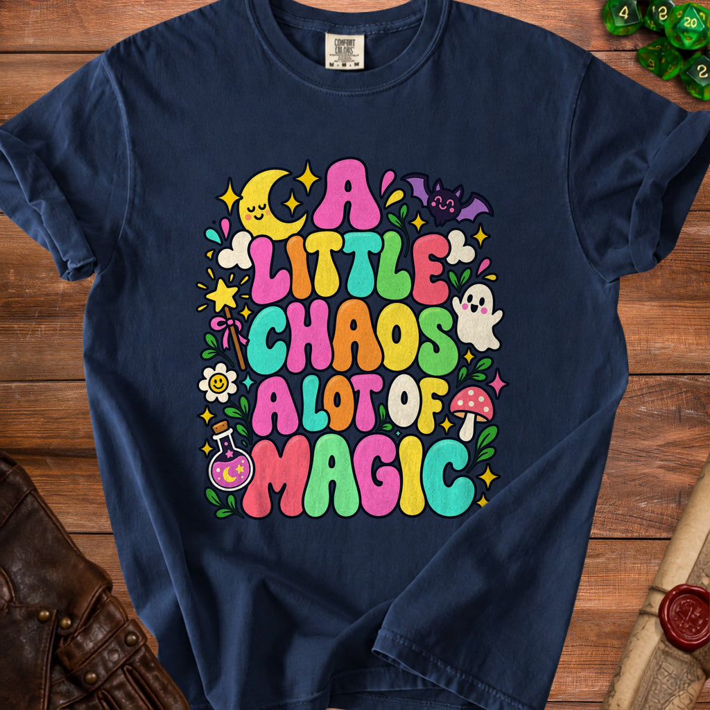 Navy t-shirt with "A Little Chaos A Lot of Magic" text and whimsical illustrations.