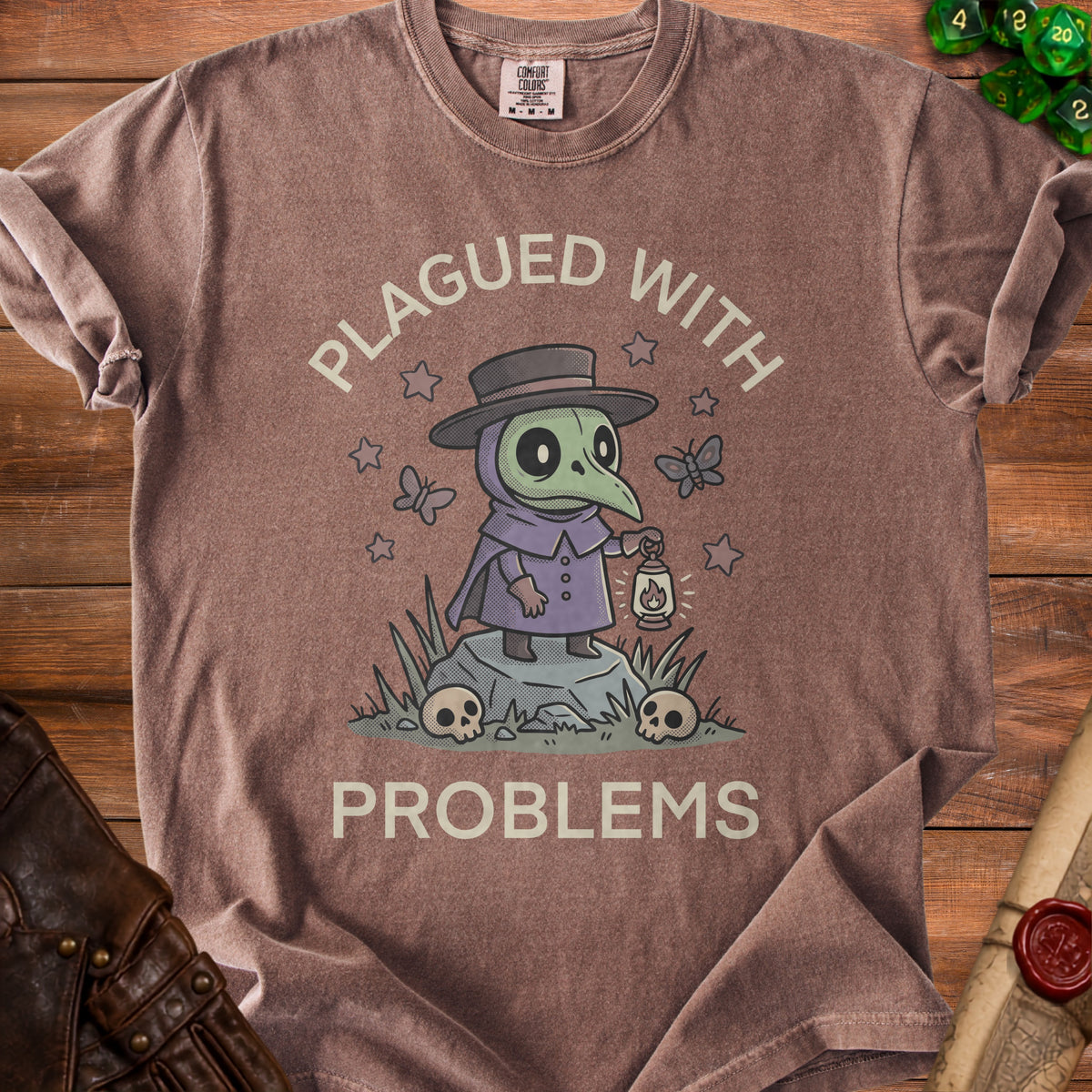 Brown t-shirt with Plague Doctor graphic and text "PLAGUED WITH PROBLEMS".